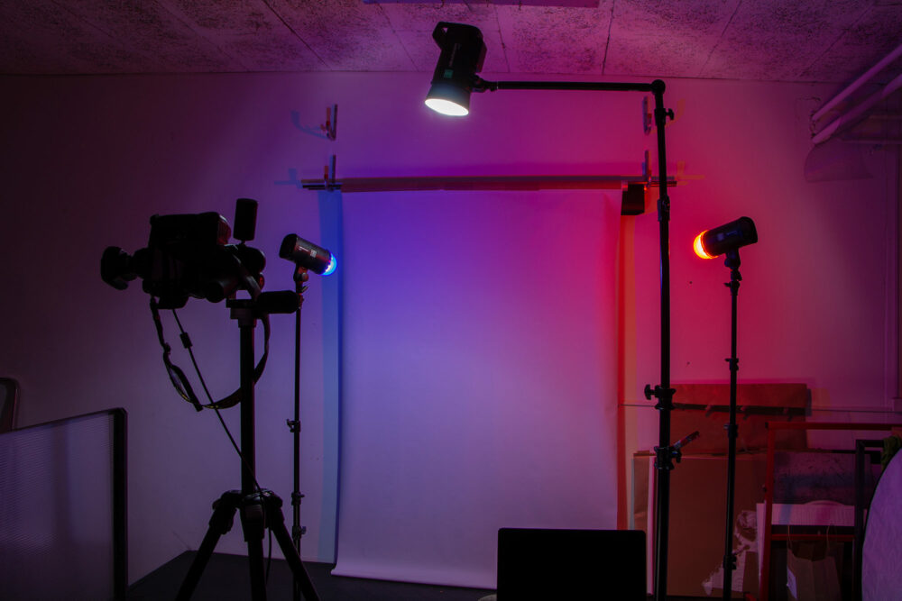 Behind the scenes with two Elinchrom ONE with colored gel domes and an Elinchrom FIVE